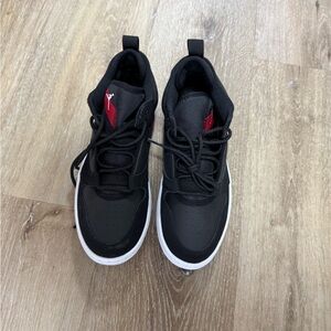 Black High-Top Jordan sneakers with Red Accents